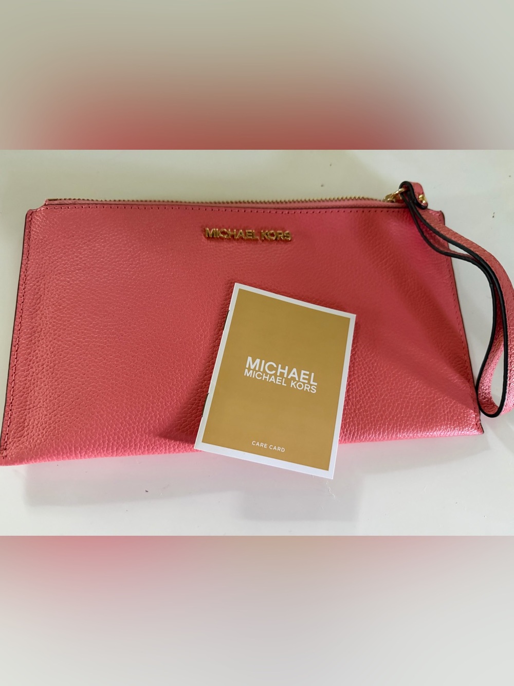 NWOT Michael Kors wristlet, salmon pink